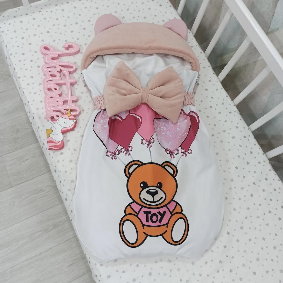 Sacco nanna con la stampa Moschino baby rosa bianco