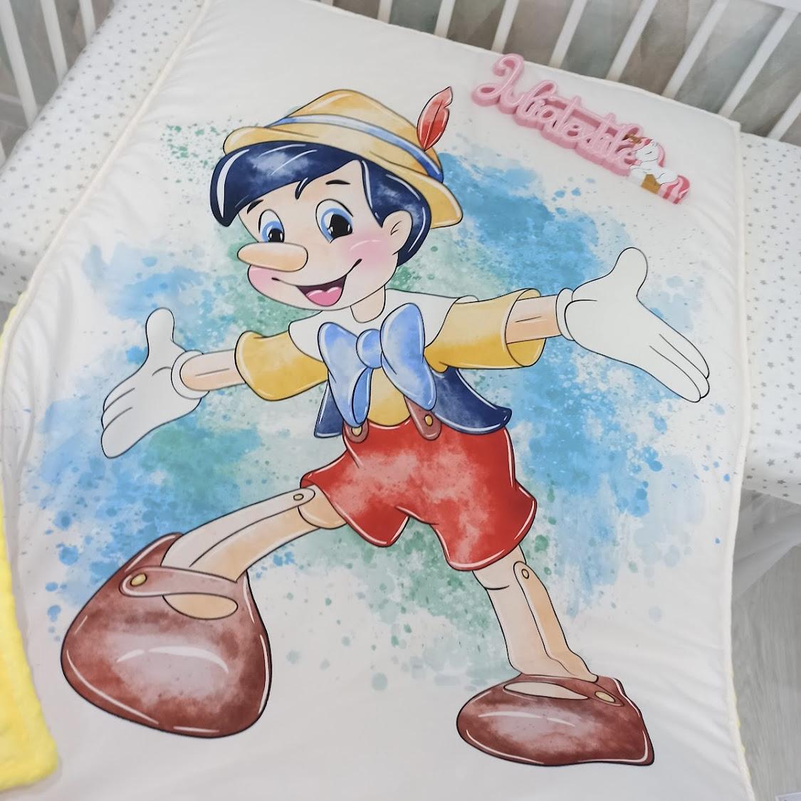 Reversible blanket with colorful Pinocchio print